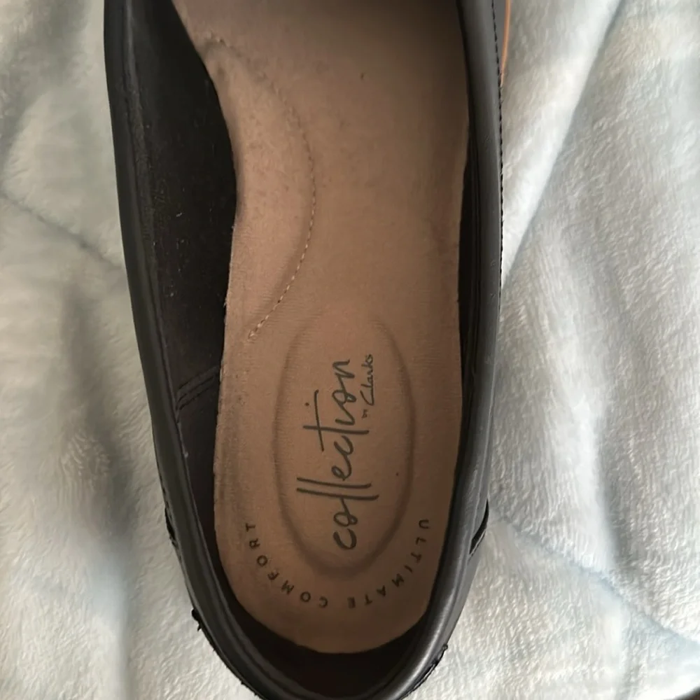 Clarks Women’s Raisie Eletta Penny Loafer in black tweed